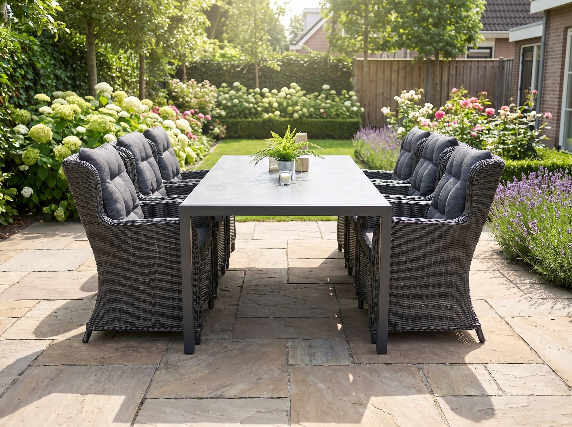 Bergamo-Delano Tuinset 6 Personen - Polystone / Rock Grey in een sfeervolle tuin - Outnest tuinmeubelen