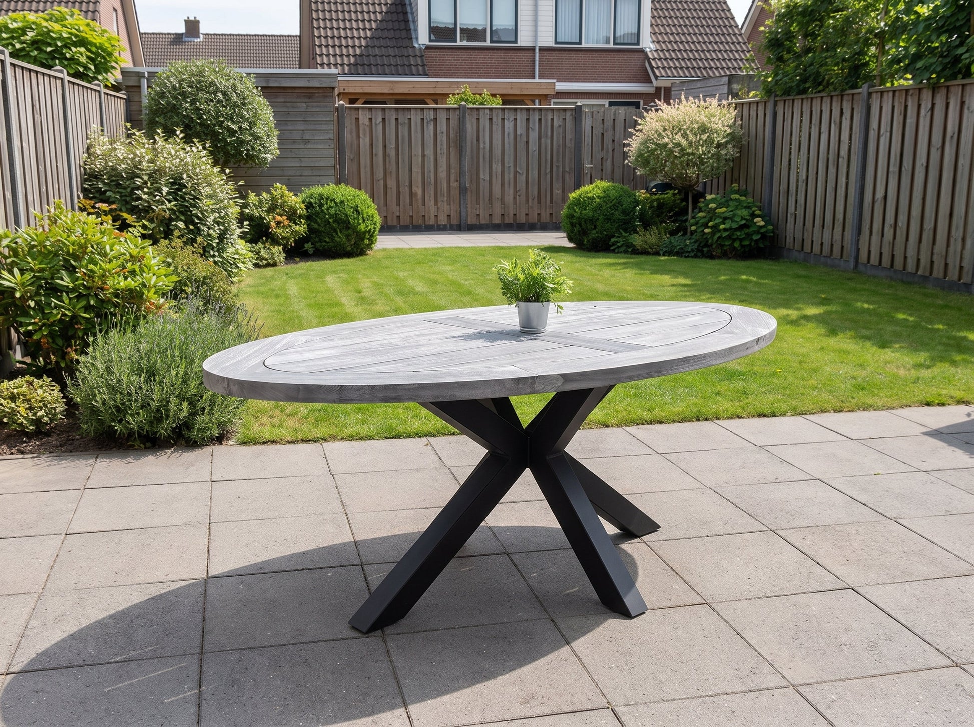 Bixley Ovale Tuintafel 240 cm - Acacia in een sfeervolle tuin - Outnest tuinmeubelen