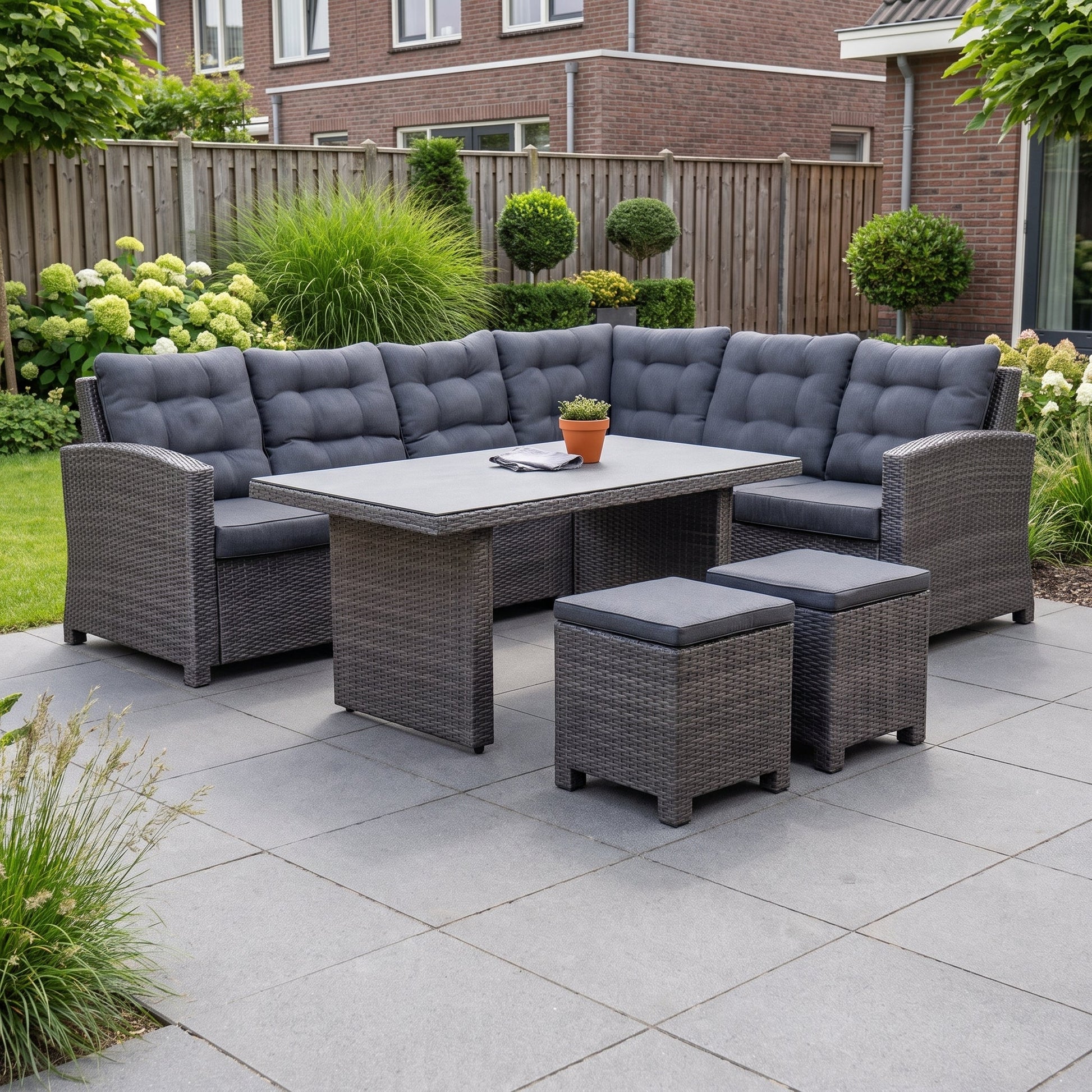 Las Palmas Dining Loungeset - Dark Grey / Hoge tafel, spraystone / Rechts in een sfeervolle tuin - Outnest tuinmeubelen