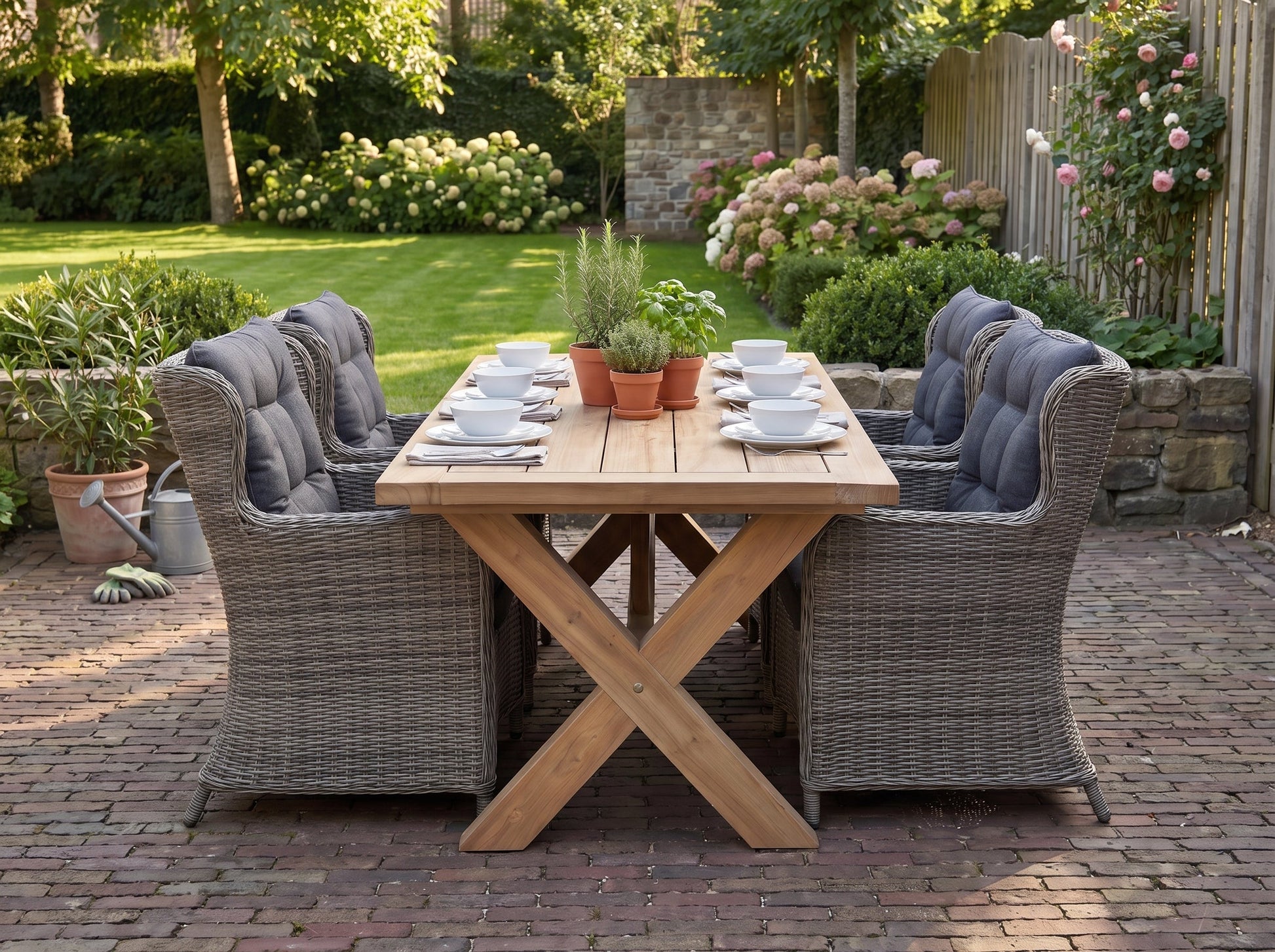 Norwich-Delano Tuinset 6 Personen - Teak / Natural Grey in een sfeervolle tuin - Outnest tuinmeubelen