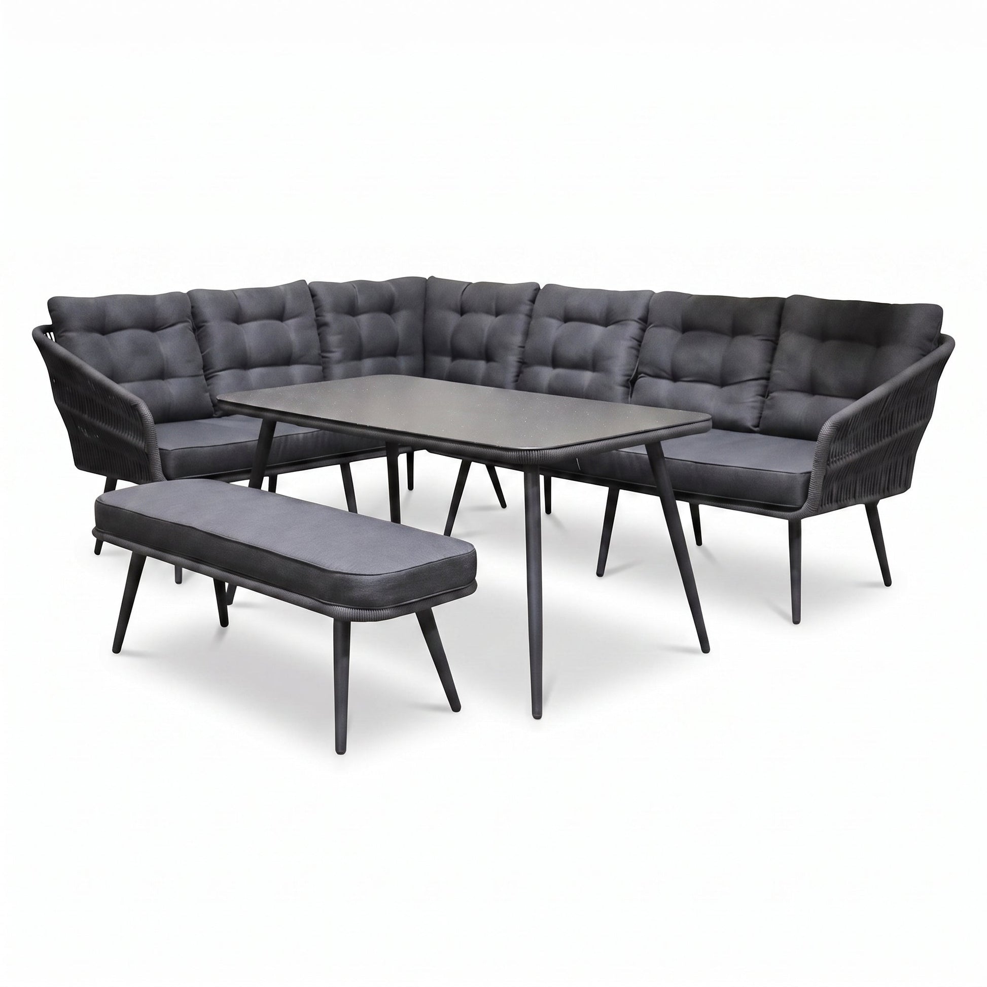 Positano Dining Loungeset - Anthracite (links) in een sfeervolle tuin - Outnest tuinmeubelen