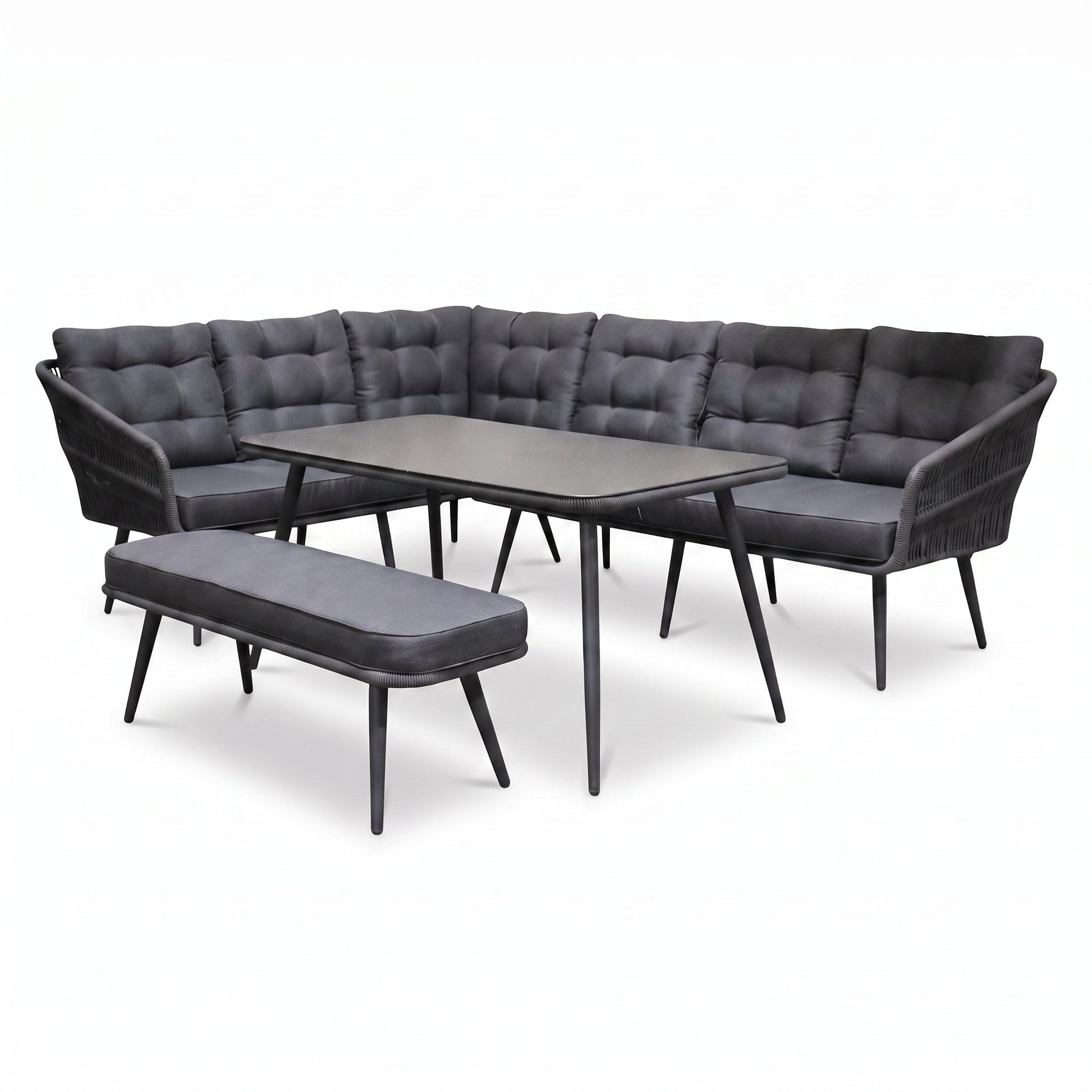 Positano Dining Loungeset - Anthracite (links) in een sfeervolle tuin - Outnest tuinmeubelen